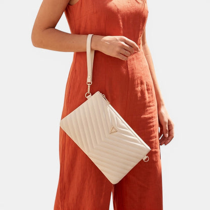 Lederax cream quilted faux leather clutch bag with V-stitch detail and gold hardware, held by a wrist strap.